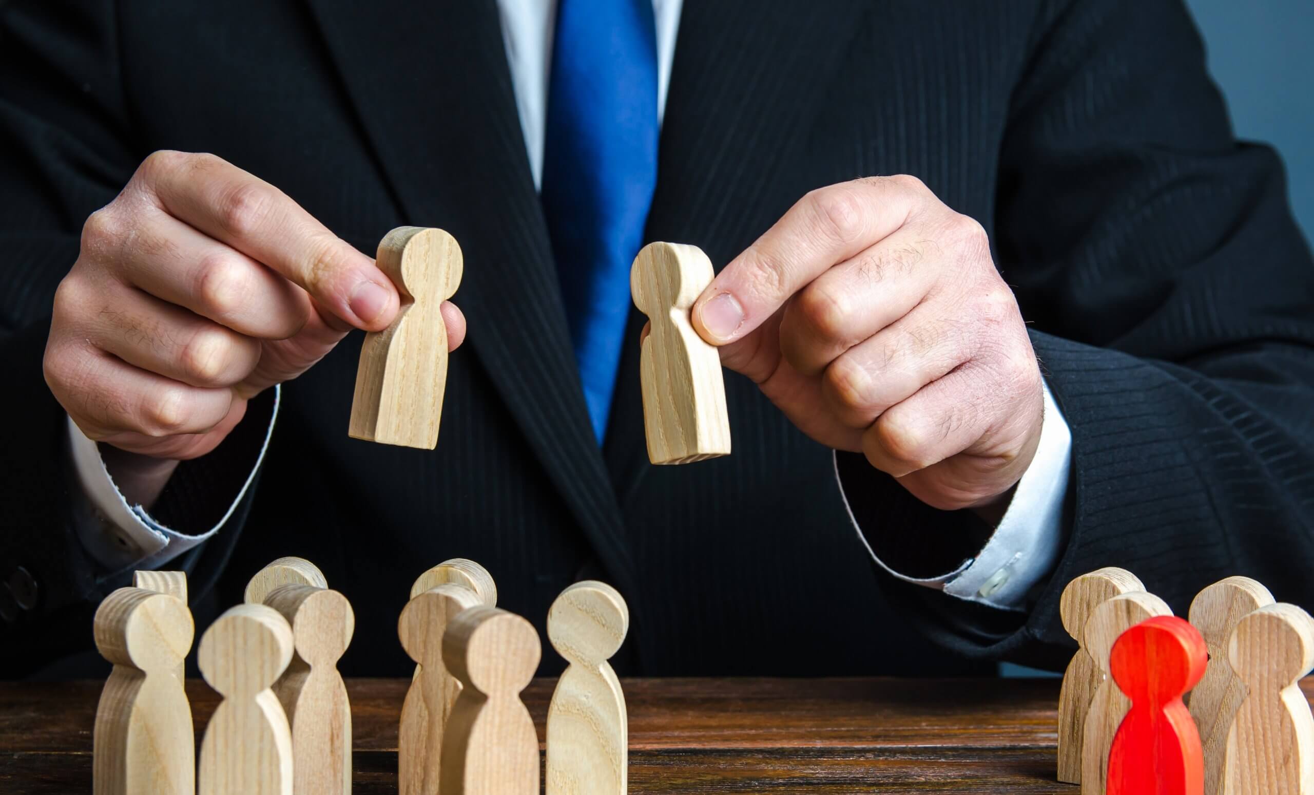 a-businessman-evaluates-candidates-for-employment-2023-11-27-04-56-41-utc